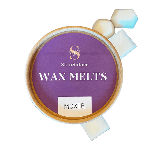 Moxie Wax Melts,Moxie Massage Candle,The Moxie Massage Candle offers a dual-purpose experience by combining the soothing ambiance of a candle with the luxurious benefits of a massage oil. As the candle burns, it transforms into a warm, fragrant massage oil that nourishes the skin and creates a relaxing atmosphere. Enjoy the calming glow, delightful scent, and the indulgence of a sensual massage all in one product